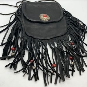 Small black leather fringed shoulder or belt bag